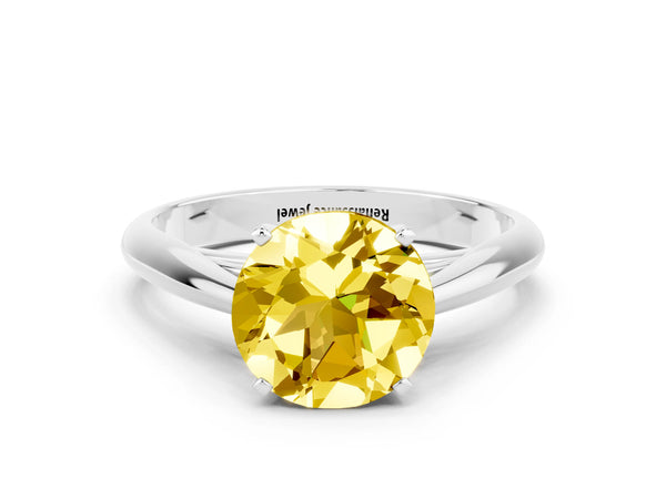 White gold Round Cut Yellow Sapphire Solitaire Engagement Ring with Cathedral Setting and Four-Prong Mount