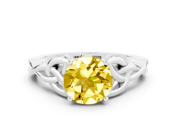 Silver Round Cut Yellow Sapphire Solitaire Engagement Ring with Celtic Knot Band and Four-Prong Setting