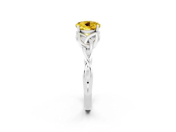 Platinum Round Cut Yellow Sapphire Solitaire Engagement Ring with Celtic Knot Band and Four-Prong Setting