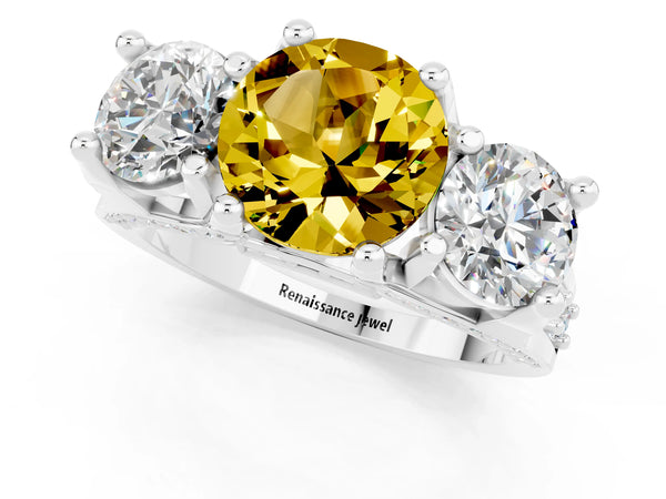 Platinum Round Cut Yellow Sapphire Three-Stone Ring with Channel Set Band and Four-Prong Setting