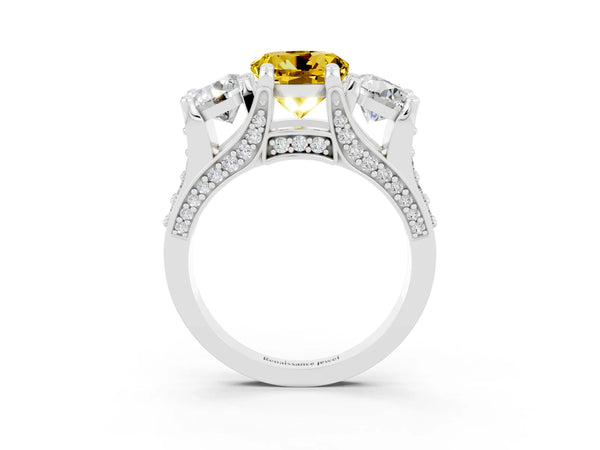 Platinum Round Cut Yellow Sapphire Three-Stone Ring with Channel Set Band and Four-Prong Setting