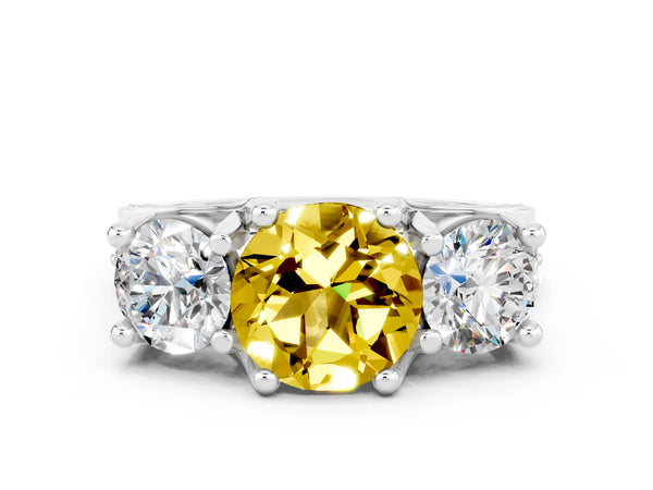 White gold Round Cut Yellow Sapphire Three-Stone Ring with Channel Set Band and Four-Prong Setting