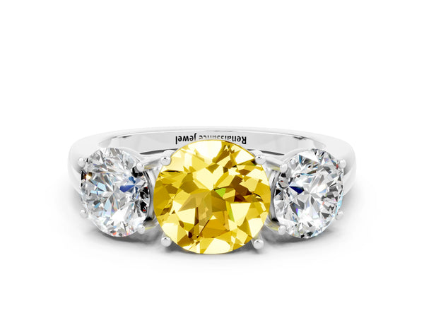 Platinum Round Cut Yellow Sapphire Three-Stone Ring with Four-Prong Setting and Classic Band