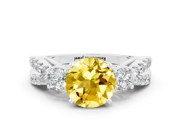 Platinum Round Cut Yellow Sapphire Three-Stone Ring with Pavé Split Shank and Four-Prong Setting
