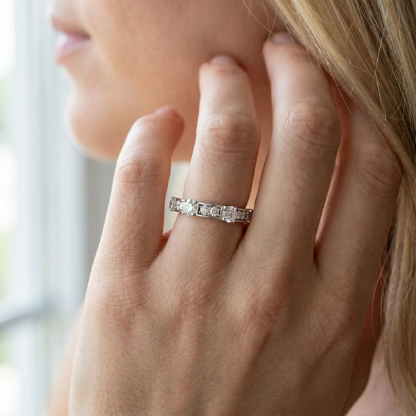 White gold Round Diamond Channel Set Eternity Band with Prong Setting