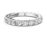 Platinum Round Diamond Eternity Band with Pavé Setting and Shared Prong
