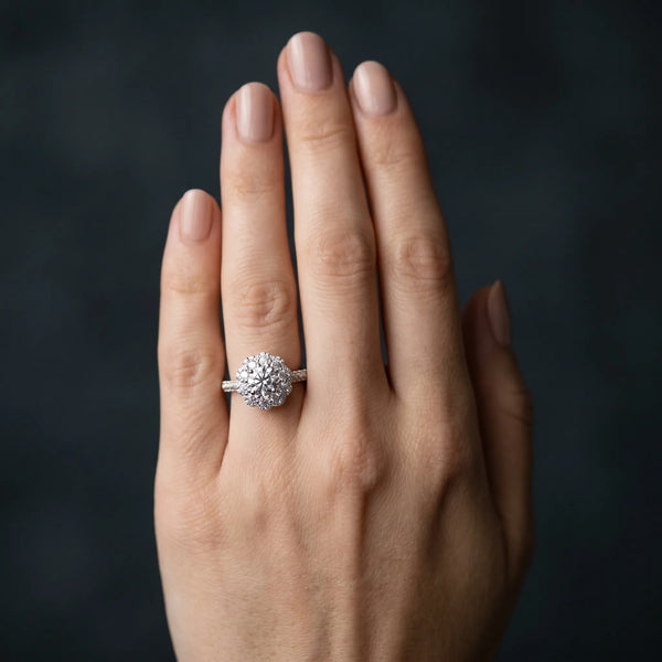 White gold Round Diamond Floral Halo Ring with Pavé Band and Four-Prong Setting