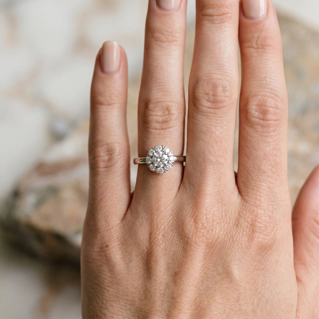 White gold Round Diamond Floral Halo Solitaire Ring with Channel-Set Band and Claw Prong Setting_24