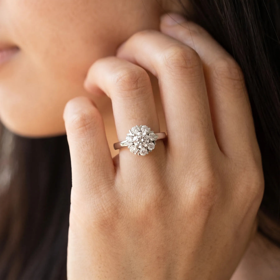 White gold Round Diamond Floral Halo Solitaire Ring with Channel-Set Band and Claw Prong Setting