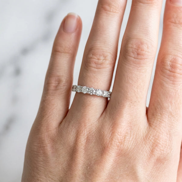White gold Round Diamond Half-Eternity Band with Shared Prong Setting