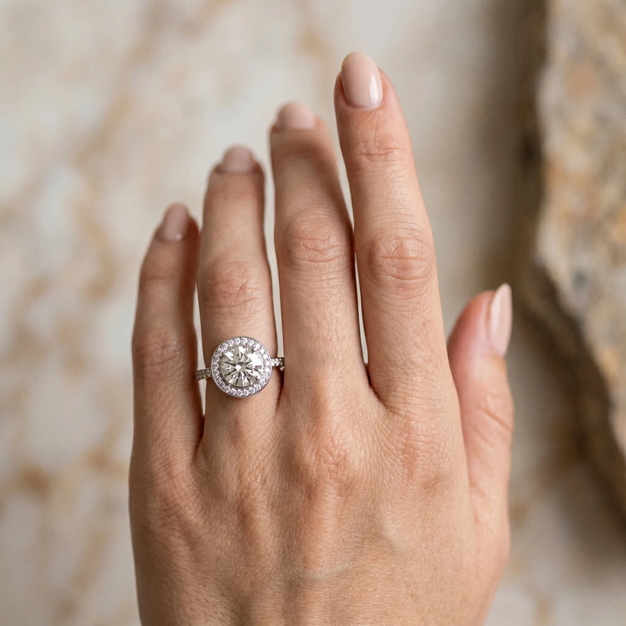White gold Round Diamond Halo Ring with Bezel Frame and Pavé Band