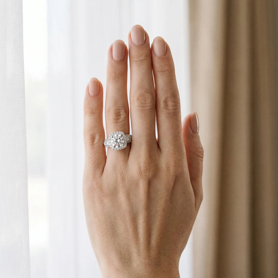 White gold Round Diamond Halo Ring with Cluster Pavé Band and Four-Prong Setting