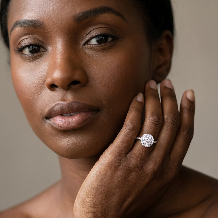 White gold Pear Cut Diamond Halo Ring with Pavé Band and Four-Prong Setting
