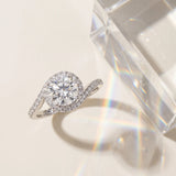 White gold Round Diamond Halo Ring with Twisted Pavé Band and Four-Prong Setting_25