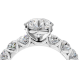White gold Round Diamond Prong Setting with Side Stones on a Pave Band_141