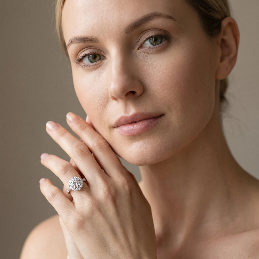 White gold Round Diamond Scalloped Halo Ring with Pavé Band and Four-Prong Setting