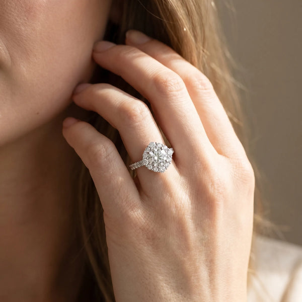 White gold Round Diamond Scalloped Halo Ring with Pavé Band and Four-Prong Setting