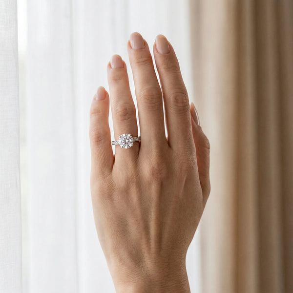 White gold Round Diamond Solitaire with Pave Band and Six-Prong Setting