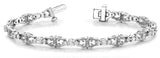White gold Round Diamond Tennis Bracelet with Fleur-de-Lis Prong Setting