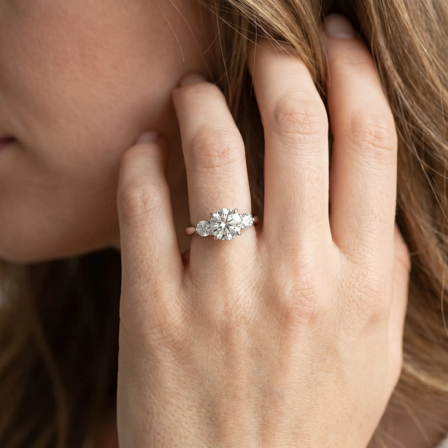 White gold Round Diamond Three-Stone Engagement Ring with Prong Setting and Pavé Band