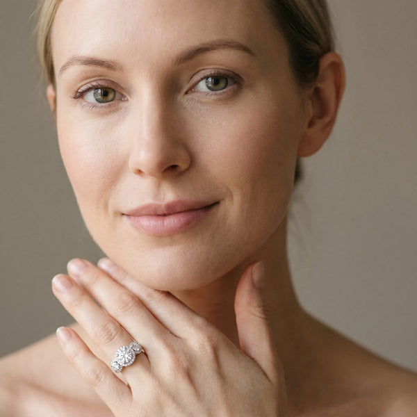 White gold Round Diamond Three-Stone Halo Ring with Prong Setting and Pavé Accents