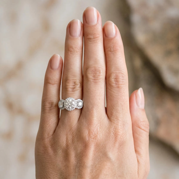 White gold Round Diamond Three-Stone Halo Ring with Prong Setting and Pavé Band