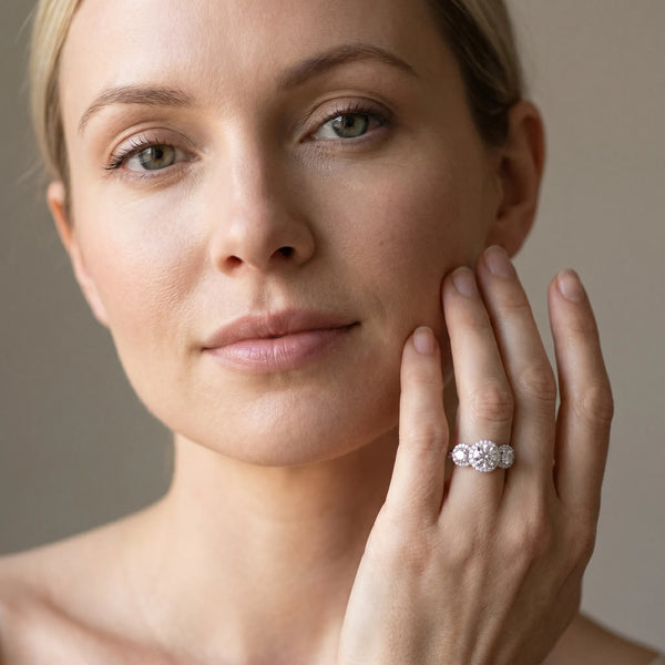 White gold Round Diamond Three-Stone Halo Ring with Prong Setting and Pavé Band