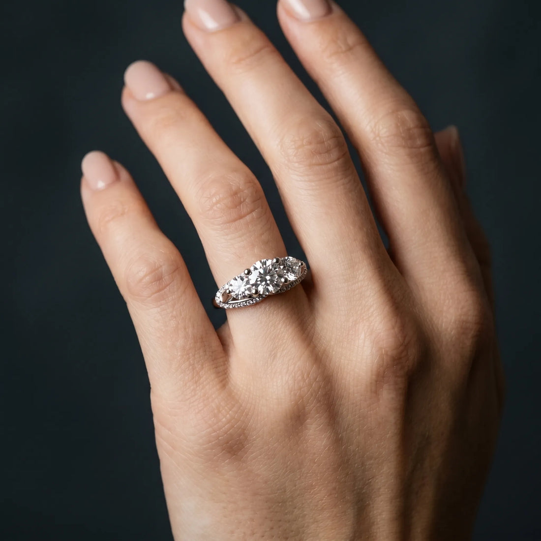 White gold Round Diamond Three-Stone Ring with Prong Setting and Pavé Band_24