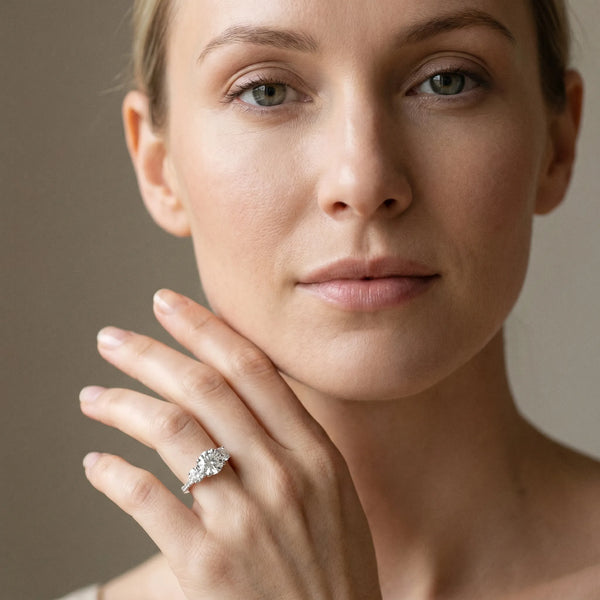 White gold Round Diamond Three-Stone Ring with Prong Setting and Pavé Band