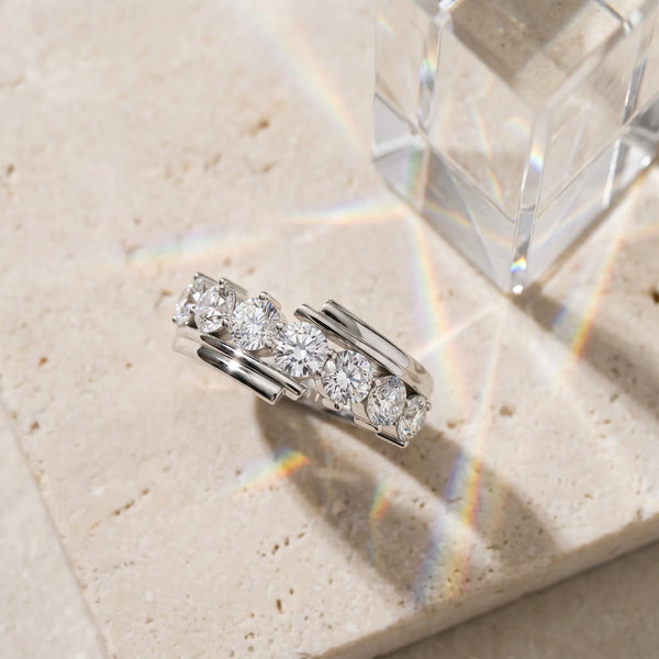 White gold Round Diamond Wave Band with Channel and Shared Prong Setting