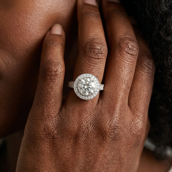 White gold Round Halo Bezel Set Diamond Ring with Pavé Band