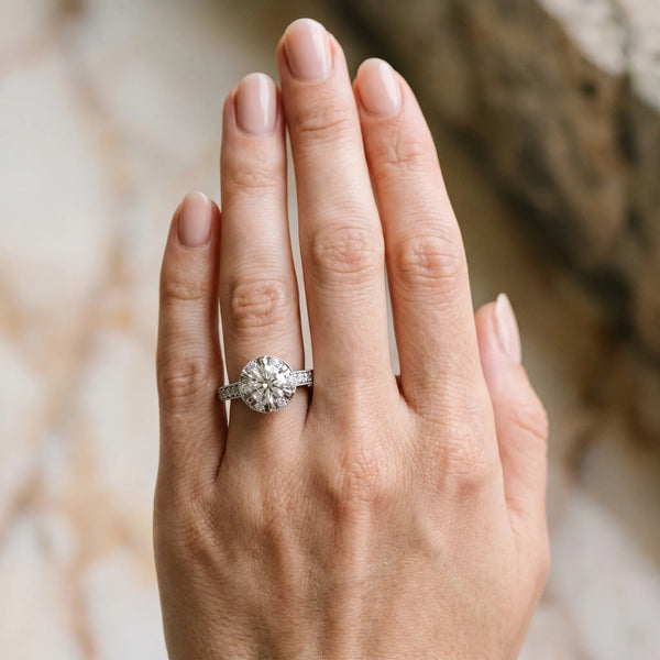 White gold Round Halo Diamond Engagement Ring with Pave Band and Claw Prong Setting
