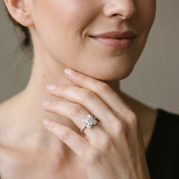 White gold Round Halo Diamond Engagement Ring with Twisted Pave Band and Four-Prong Setting