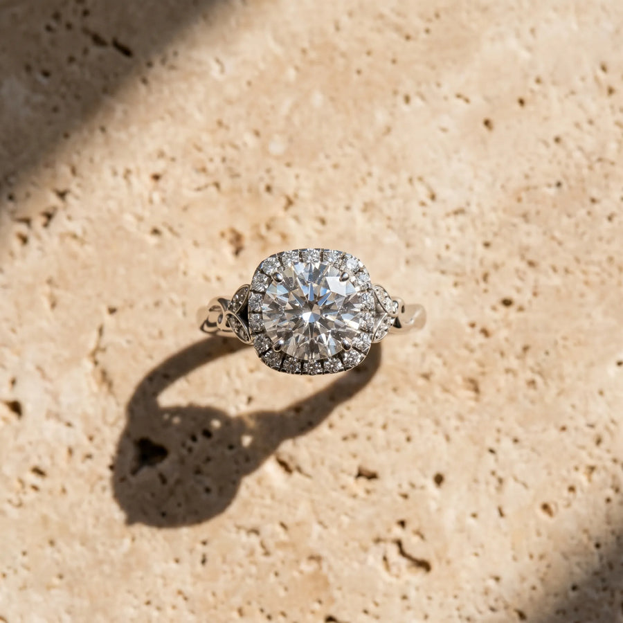 White gold Round Halo Diamond Engagement Ring with Vintage-Inspired Band and Four-Prong Setting