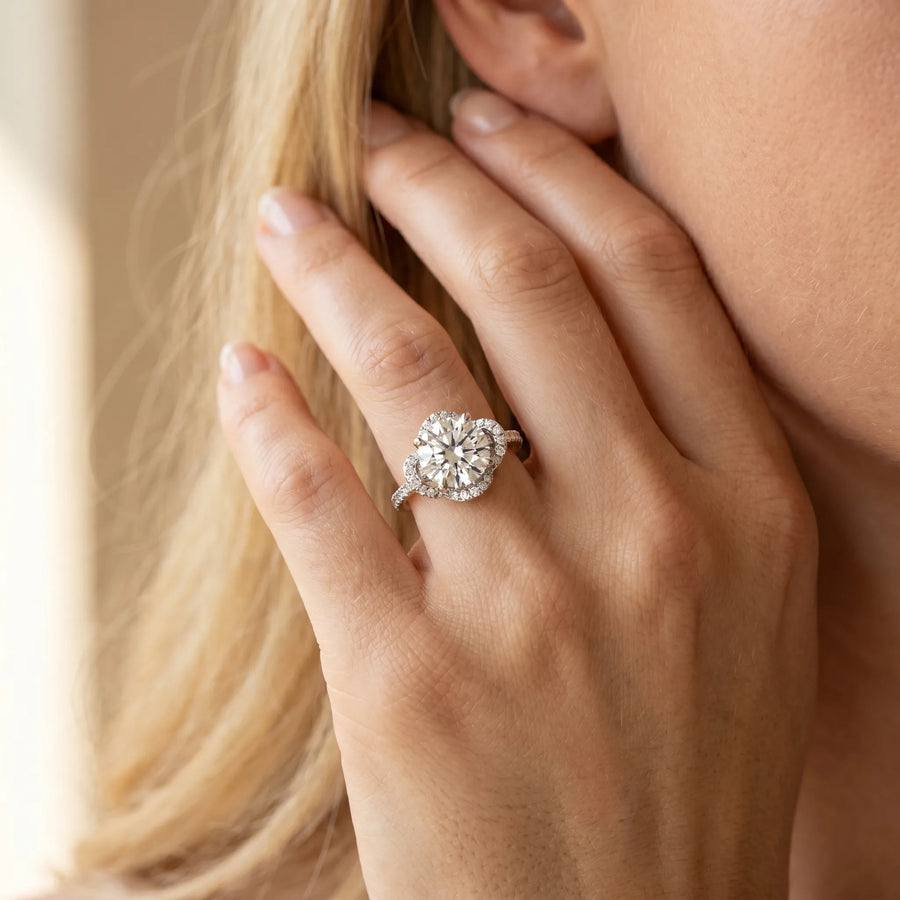 White gold Round Halo Diamond Infinity Twist Pavé Band Ring with Four-Prong Setting