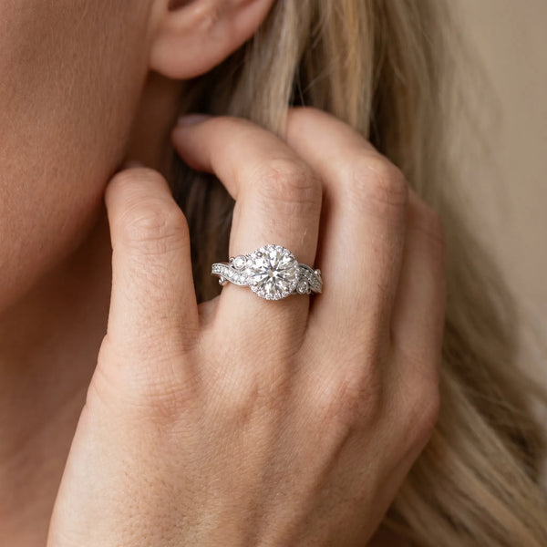 White gold Round Halo Diamond Ring with Milgrain and Bezel Accents on a Split Shank Band