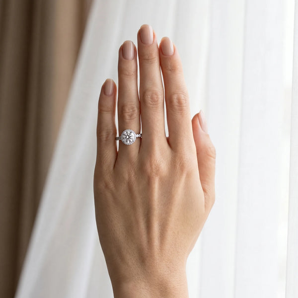White gold Round Halo Pavé Diamond Engagement Ring with Four-Prong Setting