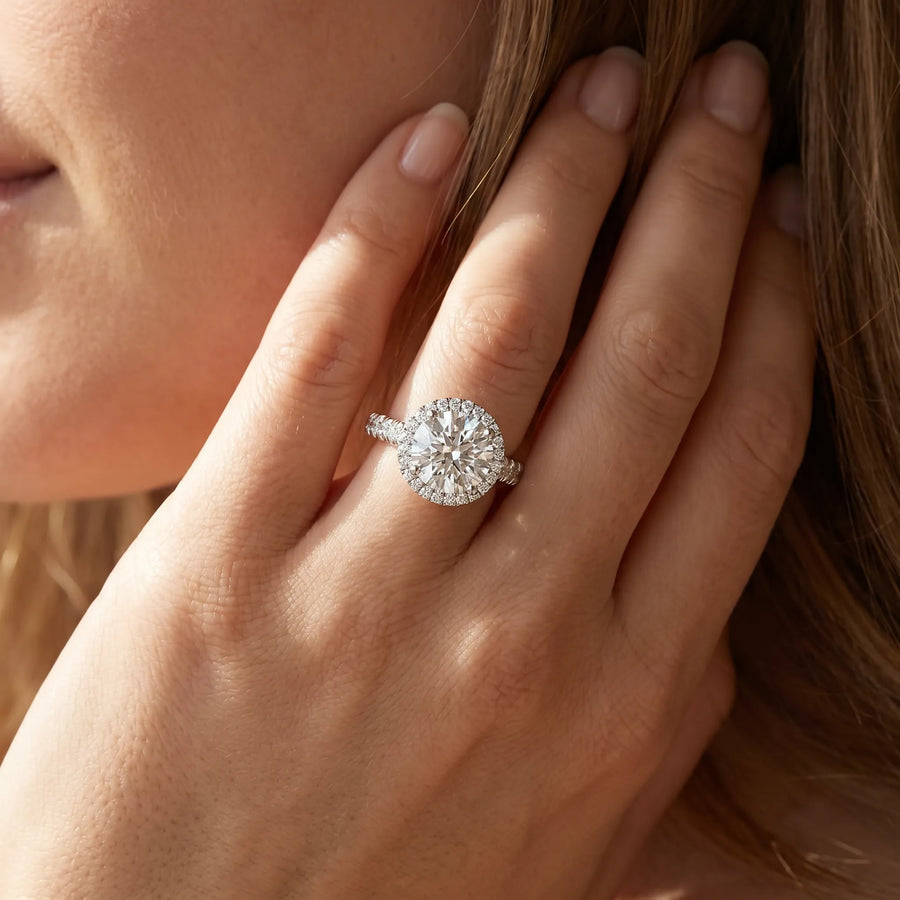 White gold Round Halo Pavé Diamond Engagement Ring with Four-Prong Setting