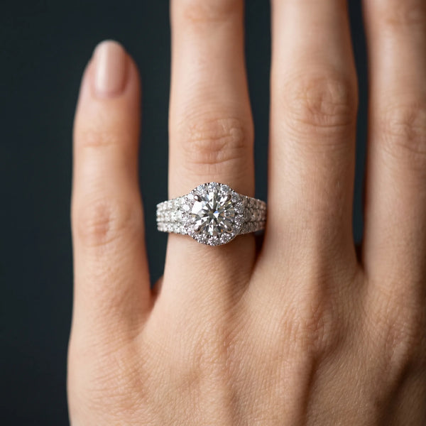 White gold Round Halo Pavé Diamond Engagement Ring with Split Shank and Four-Prong Setting