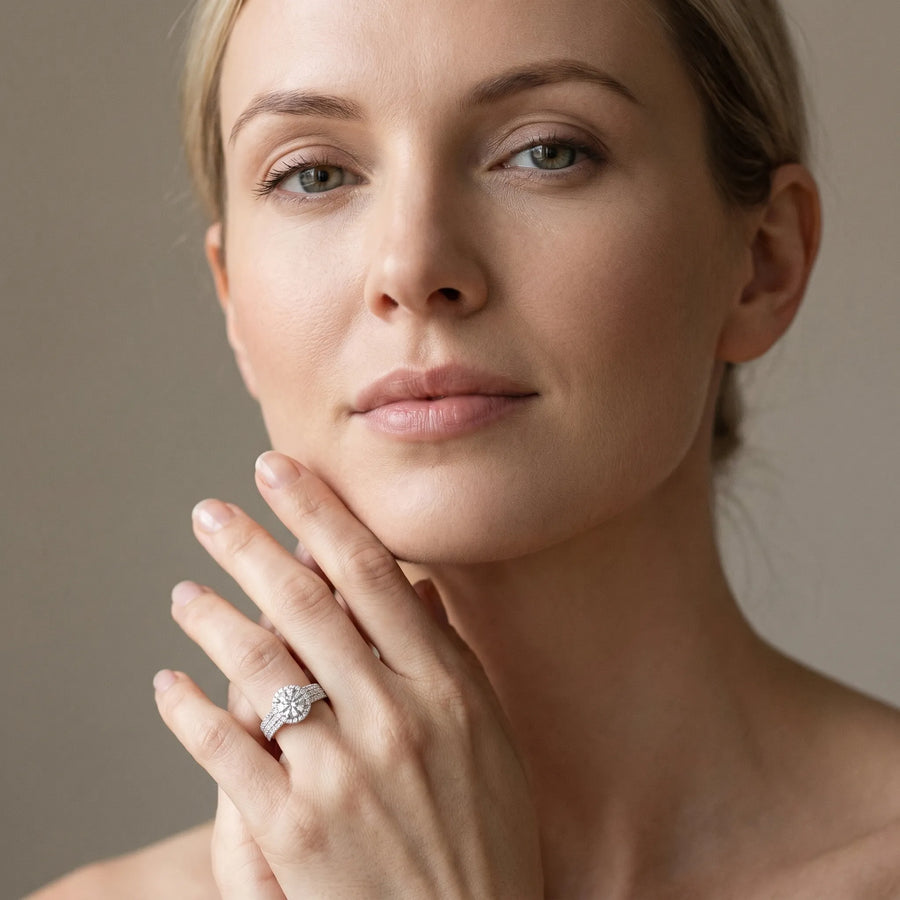 White gold Round Halo Pavé Diamond Engagement Ring with Split Shank and Four-Prong Setting