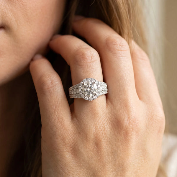 White gold Round Halo Pavé Diamond Engagement Ring with Split Shank and Four-Prong Setting