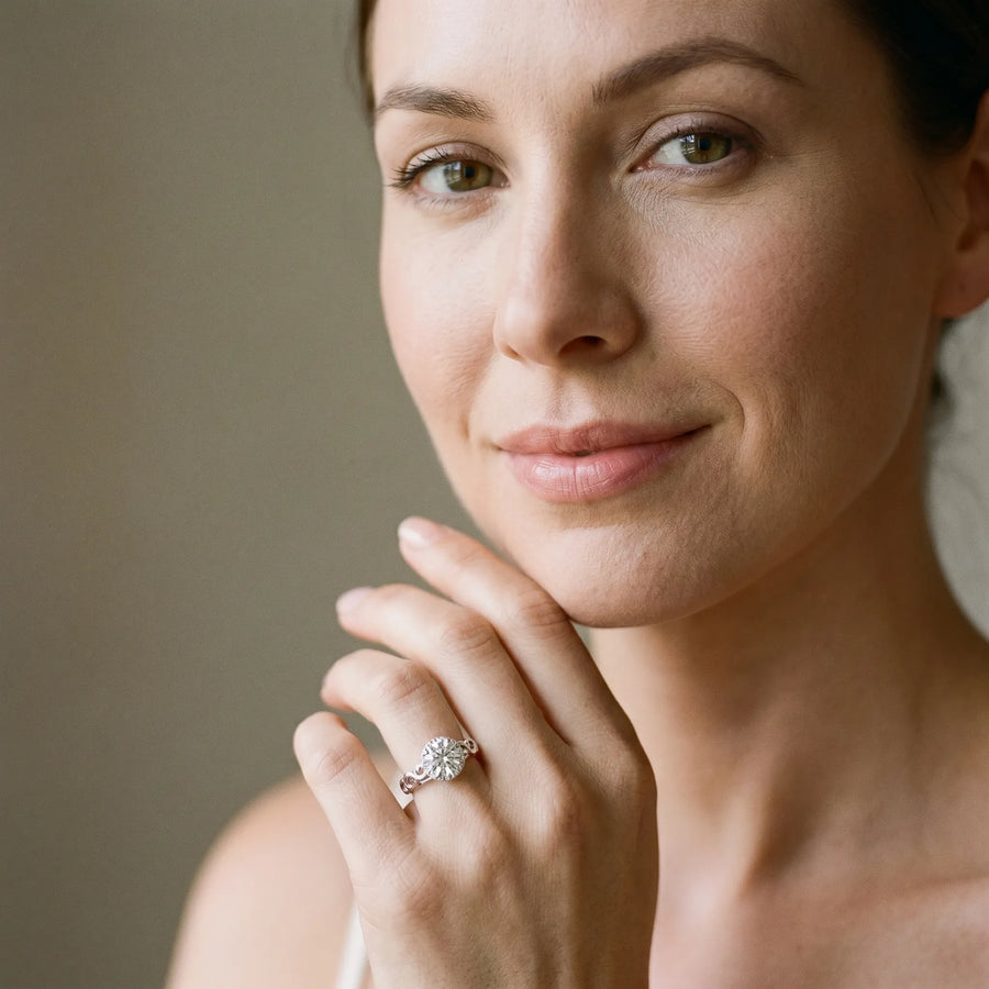 White gold Round Halo Solitaire with Scrollwork Band and Four-Prong Setting