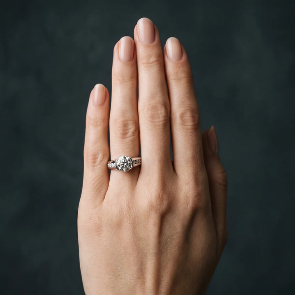 White gold Round Solitaire Bezel-Set Diamond Ring with Channel-Set Band
