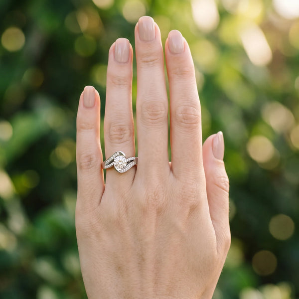 White gold Round Solitaire Bypass Diamond Engagement Ring with Channel-Set Band and Four-Prong Setting