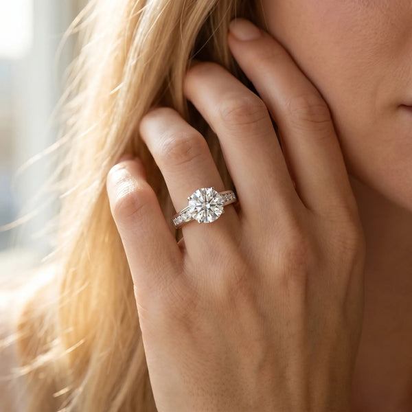 White gold Round Solitaire Channel-Set Diamond Engagement Ring with Four-Prong Setting