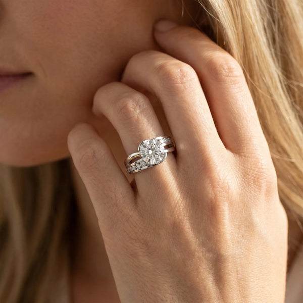 White gold Round Solitaire Channel-Set Split Shank Ring with Tension Prong Setting