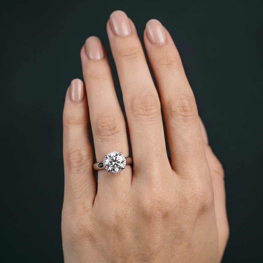 White gold Round Solitaire Diamond Engagement Ring with Four-Prong Setting and Tapered Band_6