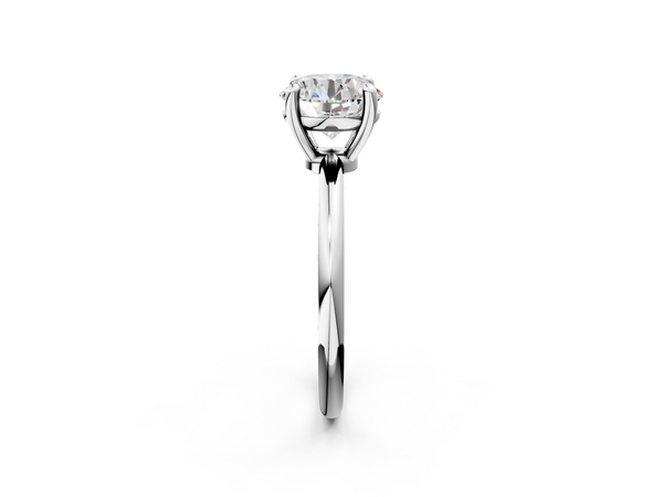 White gold Round Solitaire Diamond Ring with 4-Prong Setting on a Classic Band