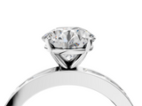 White gold Round Solitaire Diamond Ring with Channel-Set Baguette Band and Four-Prong Setting_114