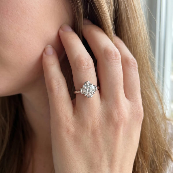 White gold Round Solitaire Diamond Ring with Floral Prong Setting and Classic Band
